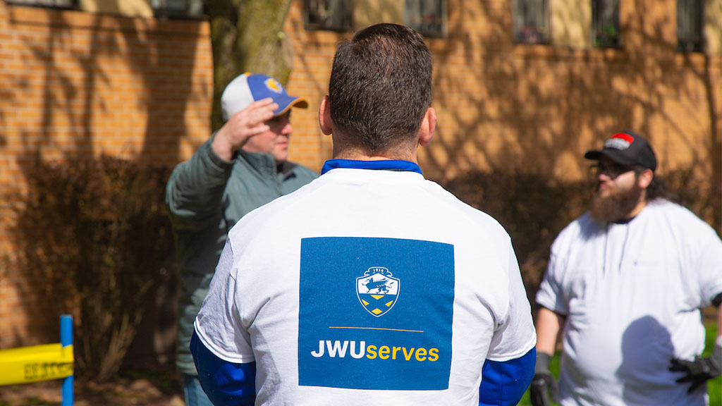 student volunteering at jwu serves