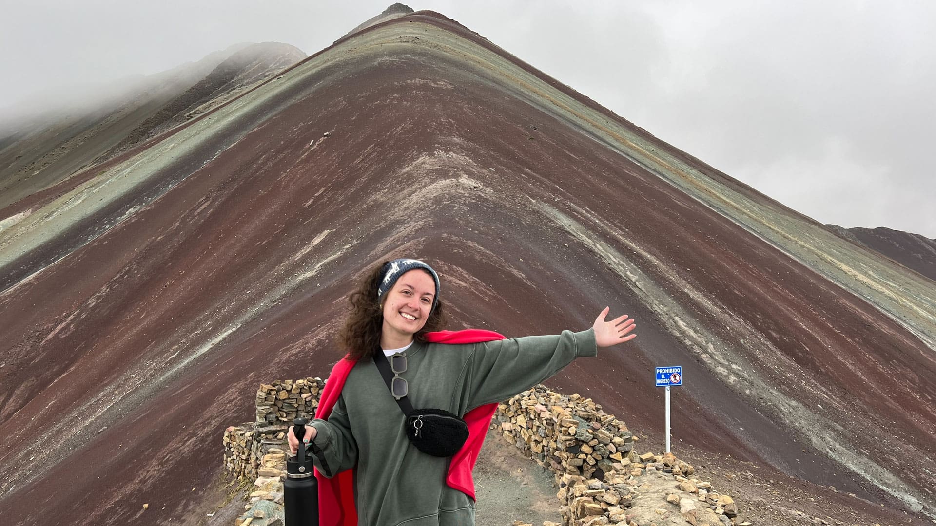 Chloe Landry '25 in front of the Rainbow Mountains in Peru