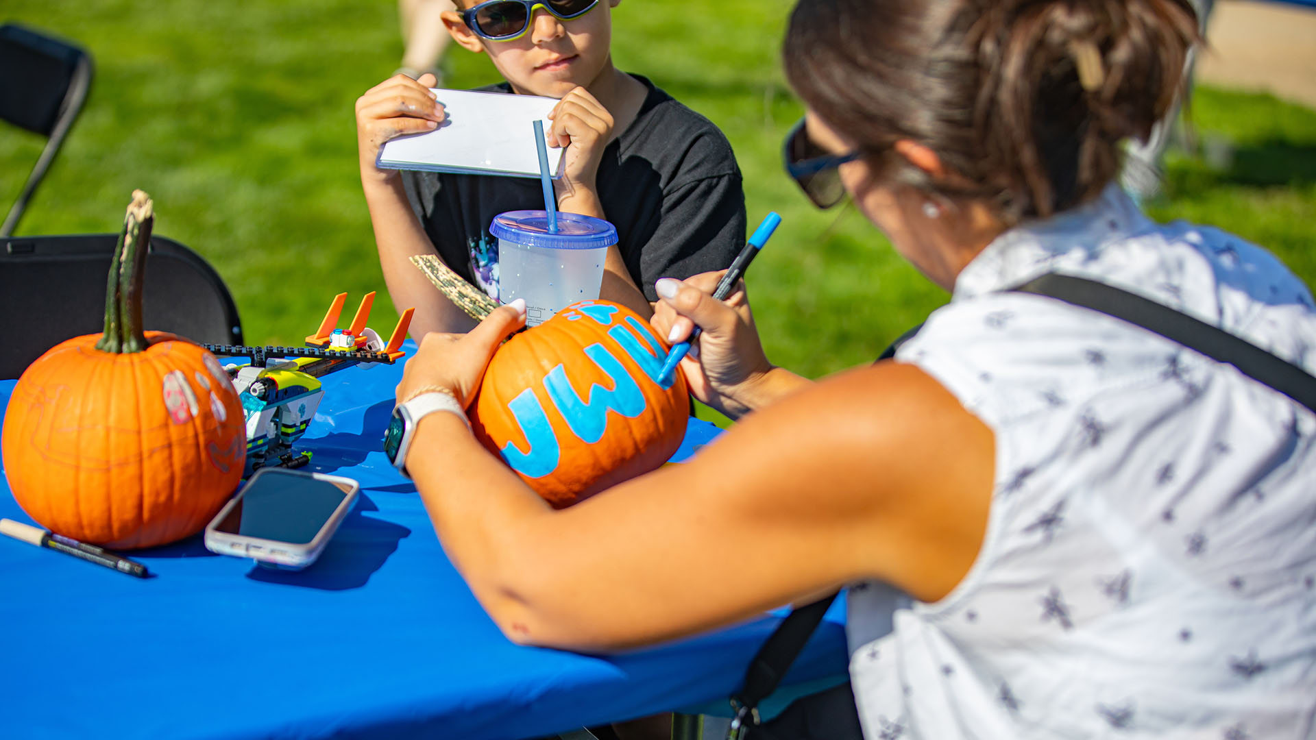 A pumpkin with JWU written on it