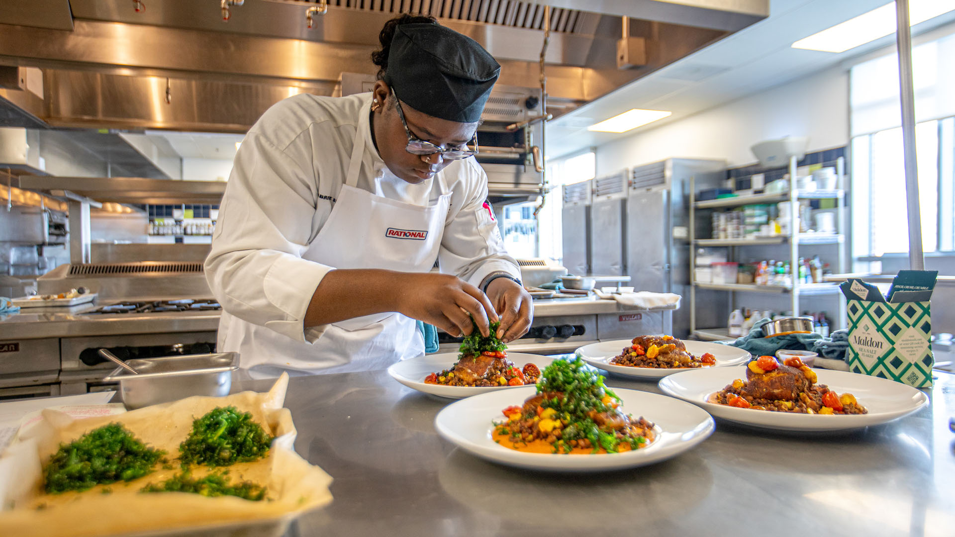 Gabby Smith plating her entrees for the scholarship program.